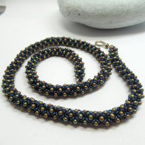 Handstitched drop and Demi round necklace